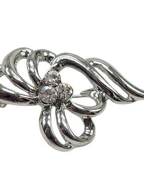Vintage Silver-Tone Floral Brooch With Rhinestone Accents Elegant Openwork Desig